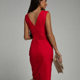 Fitted dress with V neckline and slit