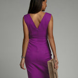 Fitted dress with V neckline and slit