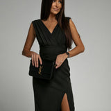 Fitted dress with V neckline and slit